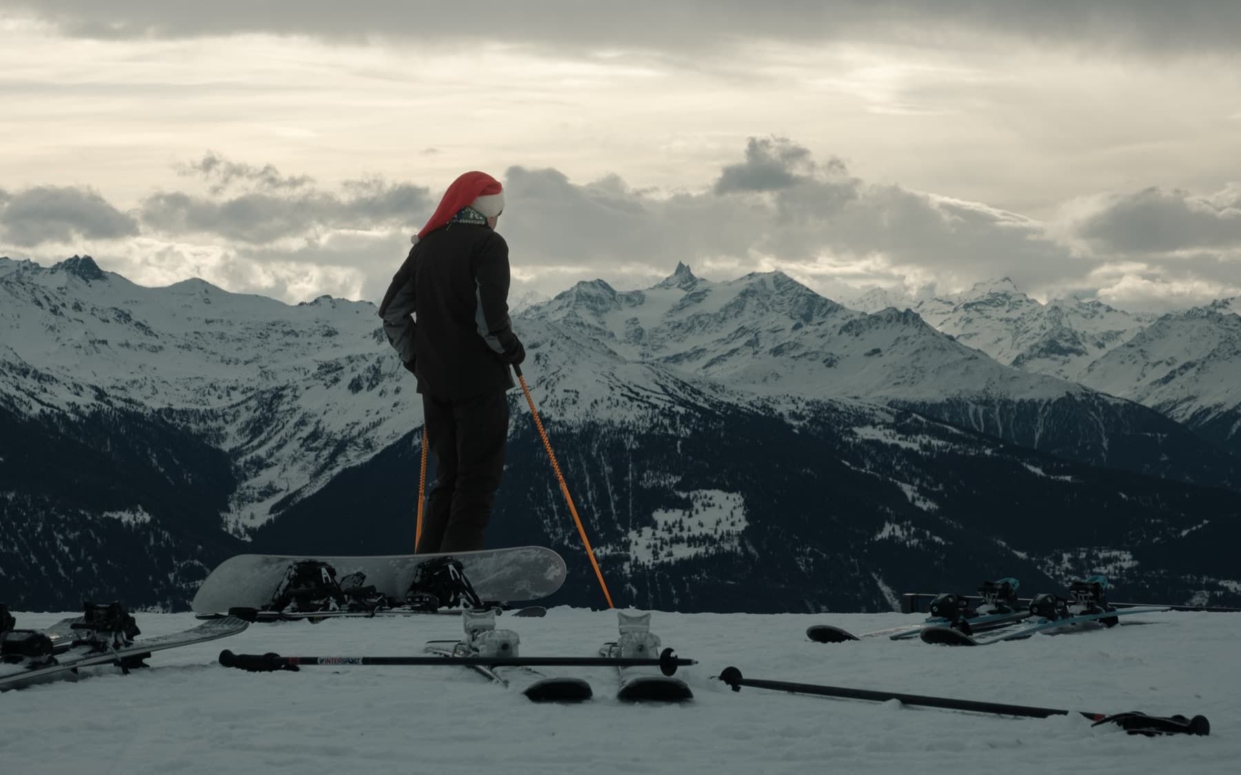 Snowboarder against alpine backdrop